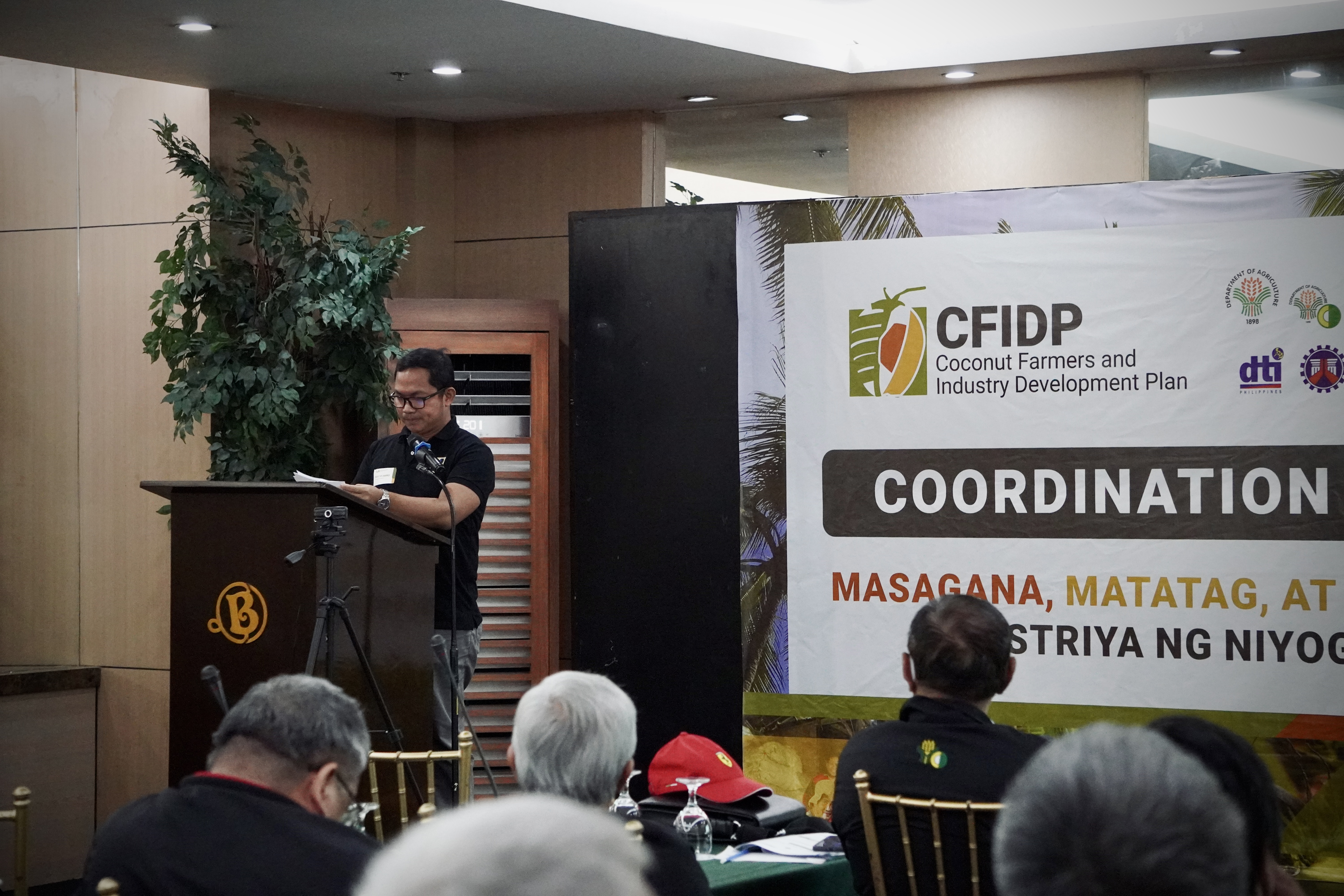 Dr. Allan B. Siano presented the CHP Research Component accomplishments and plans during the Coconut Farmers and Industry Development Plan Coordination Meeting in Quezon City. (Image credit: Crops Research Division, DOST-PCAARRD)